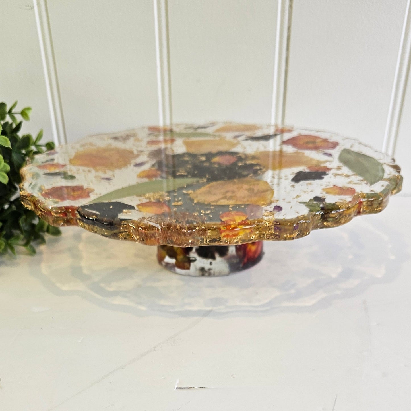 resin cake stand made with a wedding bouquet preserved
