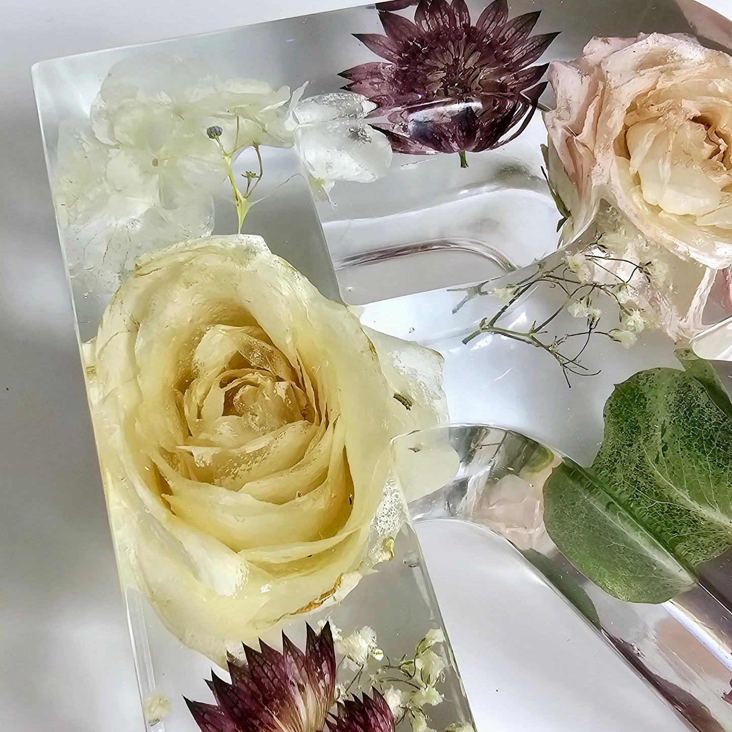 preserved wedding bouquet in resin letter r