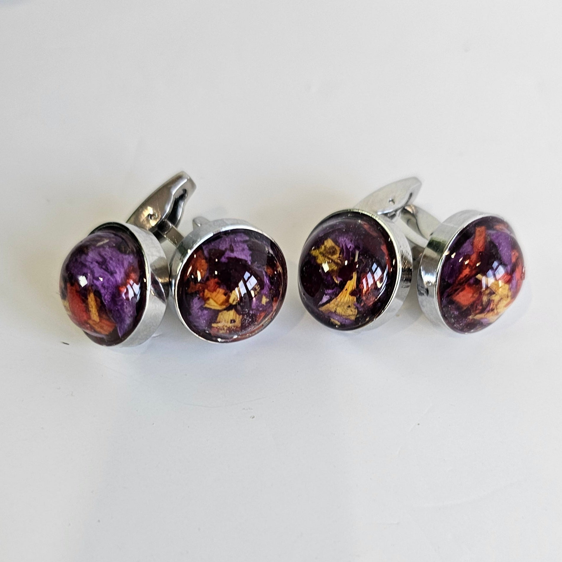 Silver cufflinks with preserved flowers