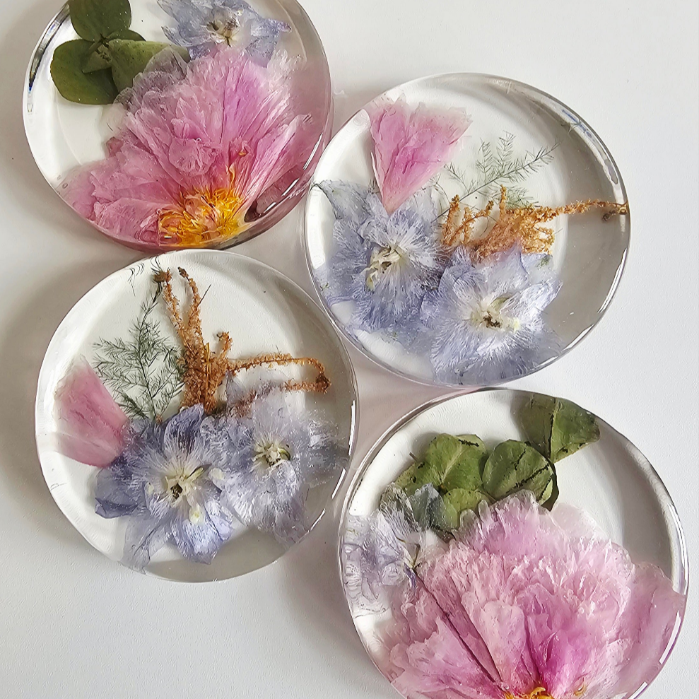 4 resin wedding bouquet preservation coasters with pink peonies and blue flowers 